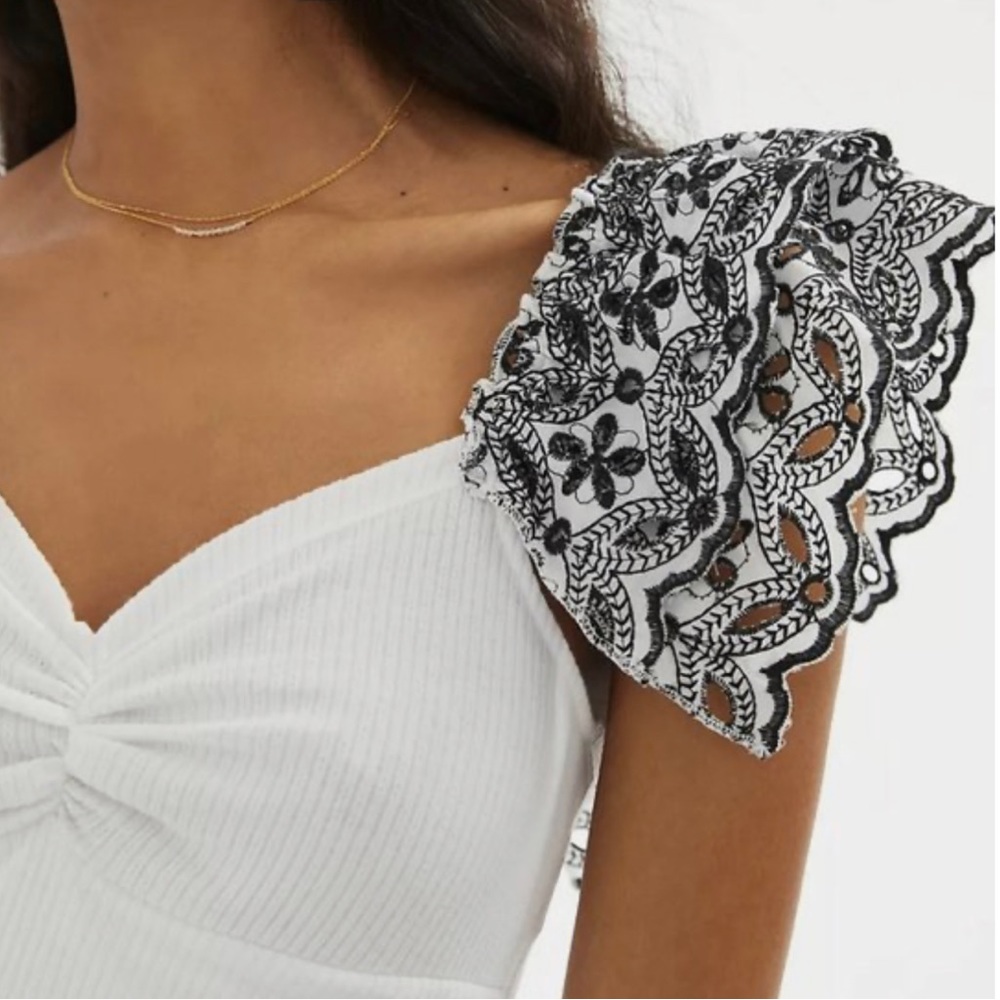 NEVER WORN WITH TAGS ANTHROPOLOGIE TOP. SIZE SMALL. BRAND NEW!!!